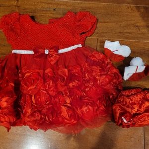 Girls 6-9 month dress. Socks and diaper cover up included. Like new